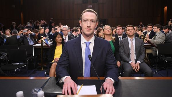 Mark Zuckerberg in the hot chair in front of US congressmen.