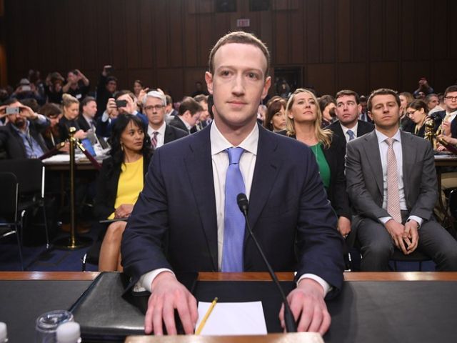 Mark Zuckerberg in the hot chair in front of US congressmen.