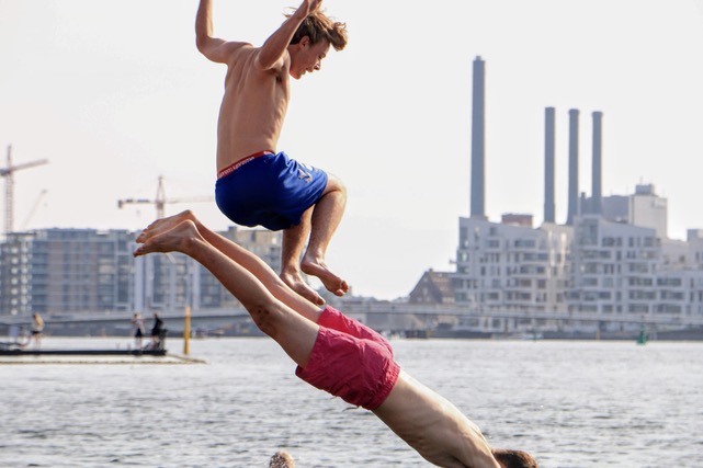 Life in the harbor: Indy frame chose this picture because of its special energy and youthful playfulness which is in contrast with the background depicting the pulse of the city and the harbor. (Photo by Niels Jakob Kyhl Jørgensen)