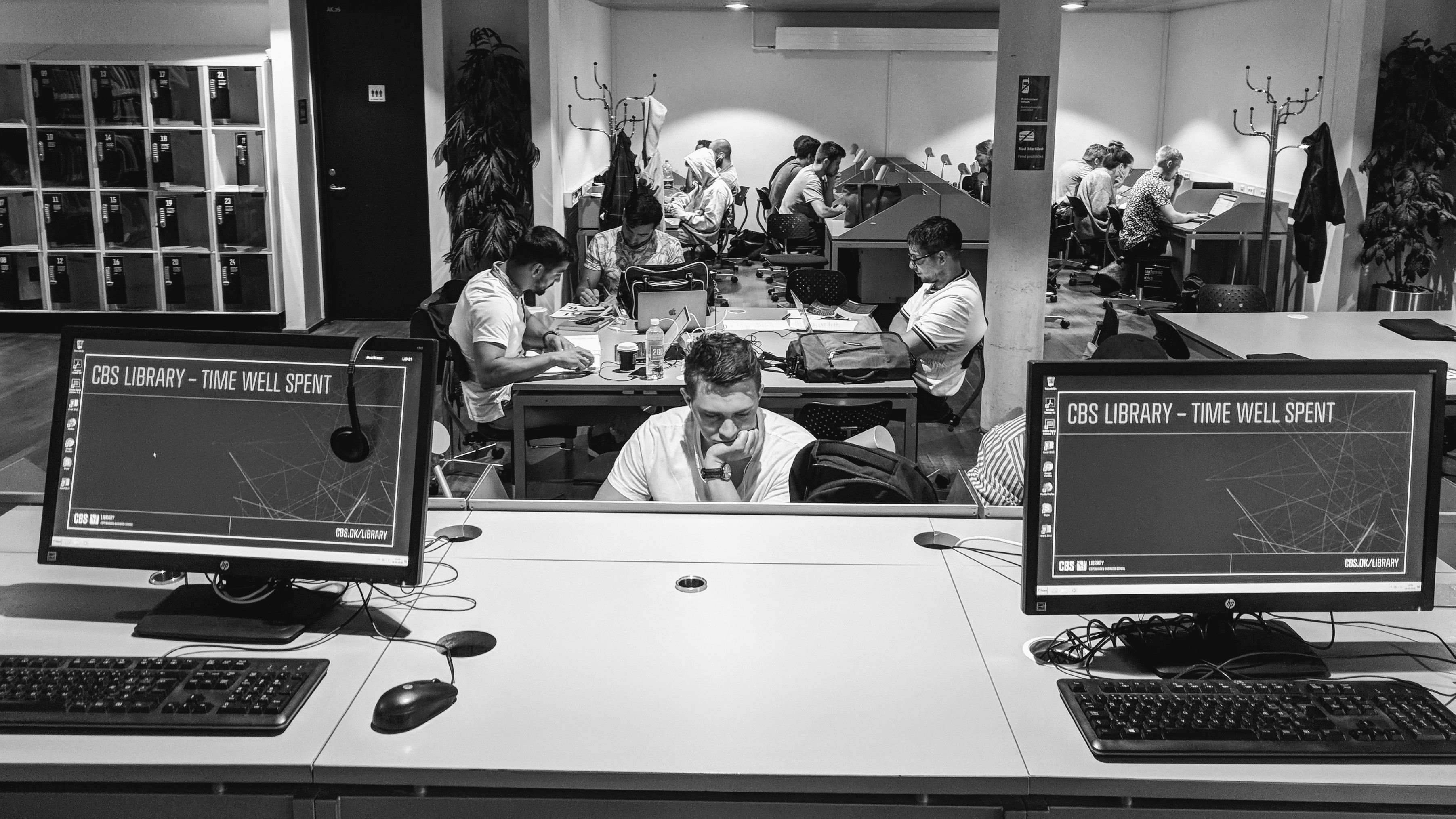 The atmosphere at CBS' campus: We chose the photo from the library because it precisely encapsulates the atmosphere when students are concentrating and preparing for their exams. We also found the photo to be very stylish and elegant, it draws the viewer in and results in them looking at it for a while. (Photo by Niels Jakob Kyhl Jørgensen)