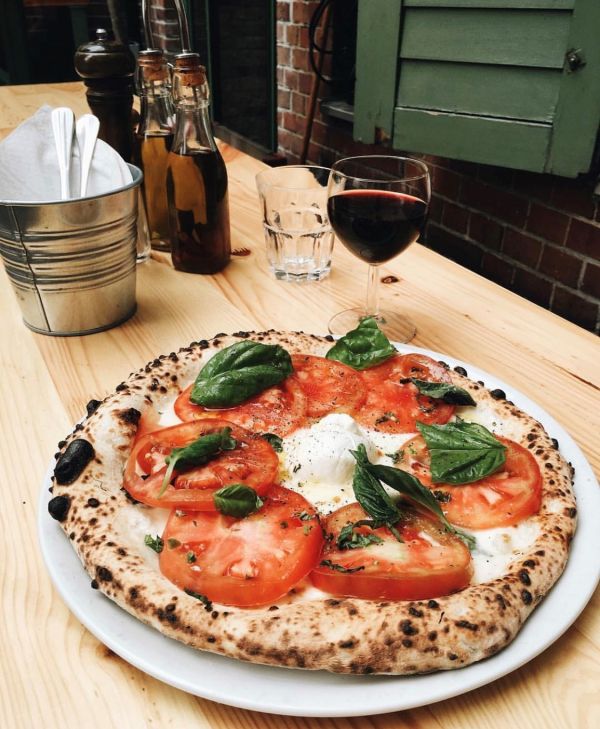 Zola makes authentic Neapolitan pizza in a fire oven. (Photo via Zola's instagram)