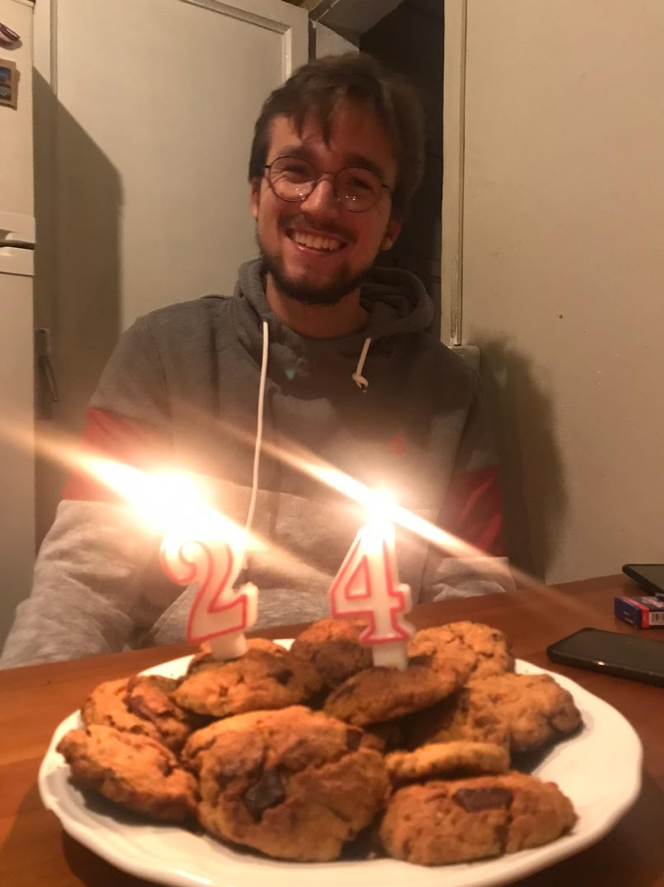 man with cookies an birthday lights (24 years old)
