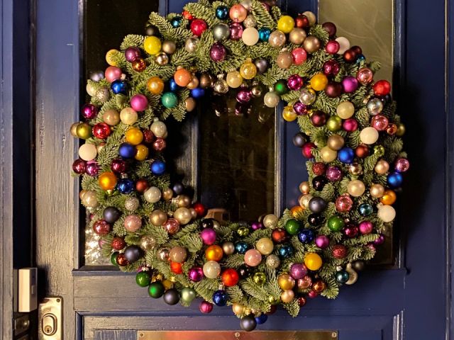 christmas wreath on blue door