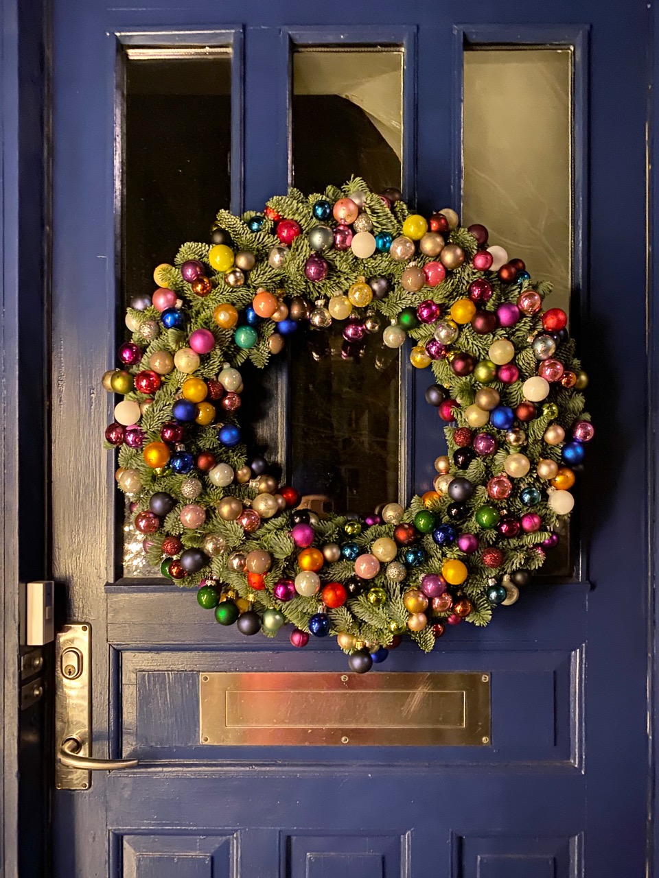 christmas wreath on blue door