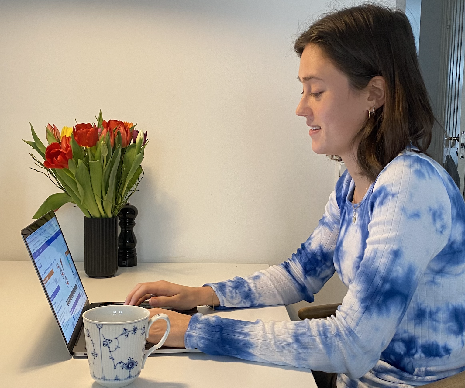 Girl studying by her computer