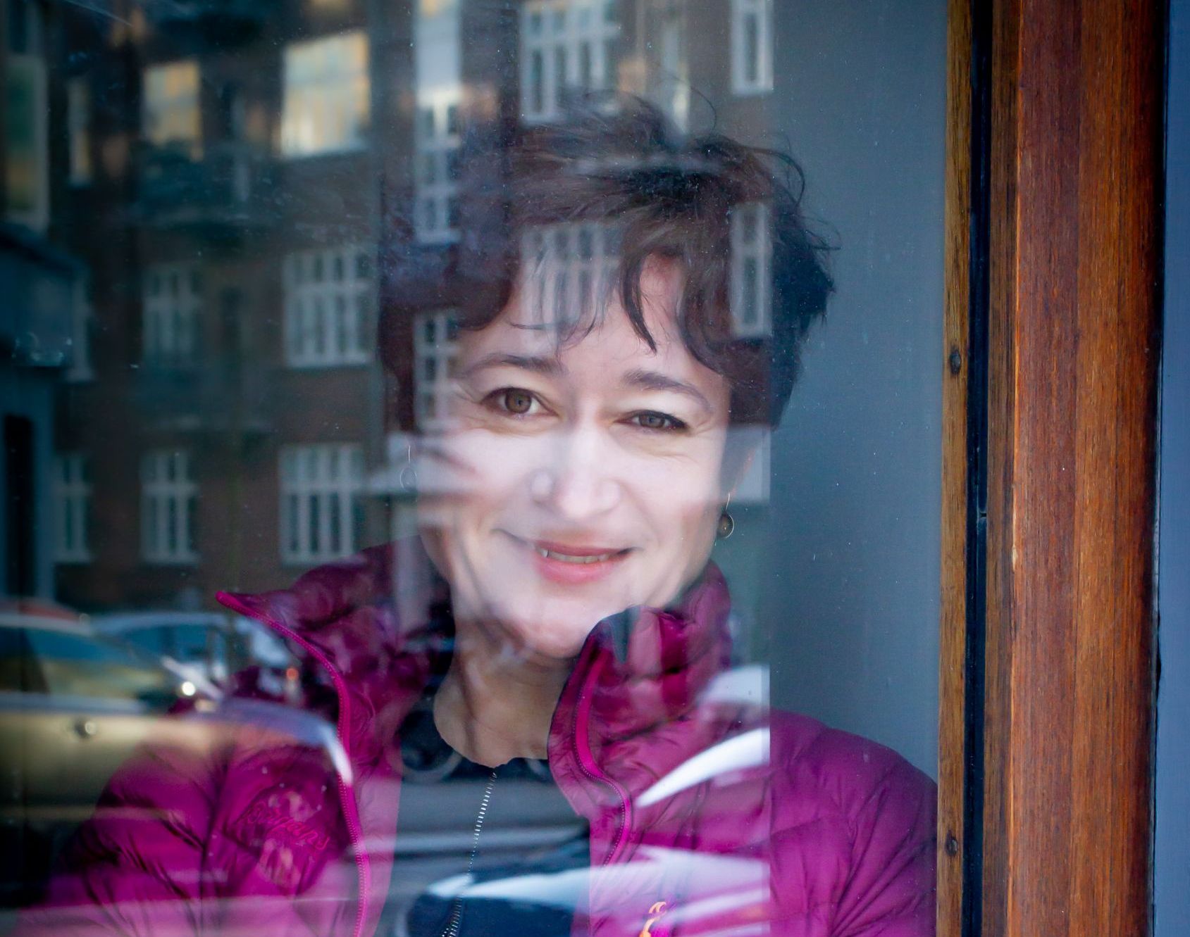 portrait of woman - reflection in window