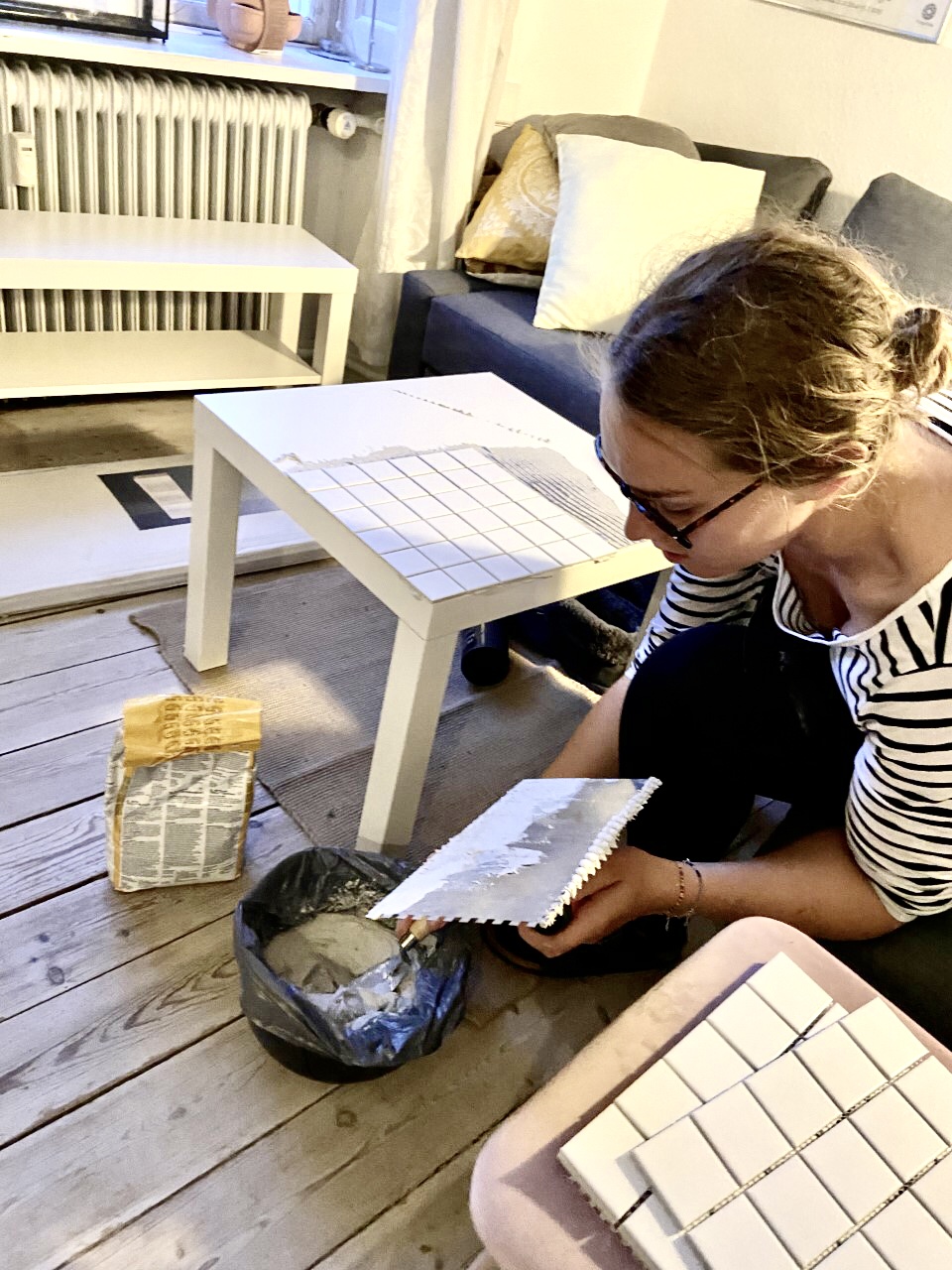 Woman fixing table