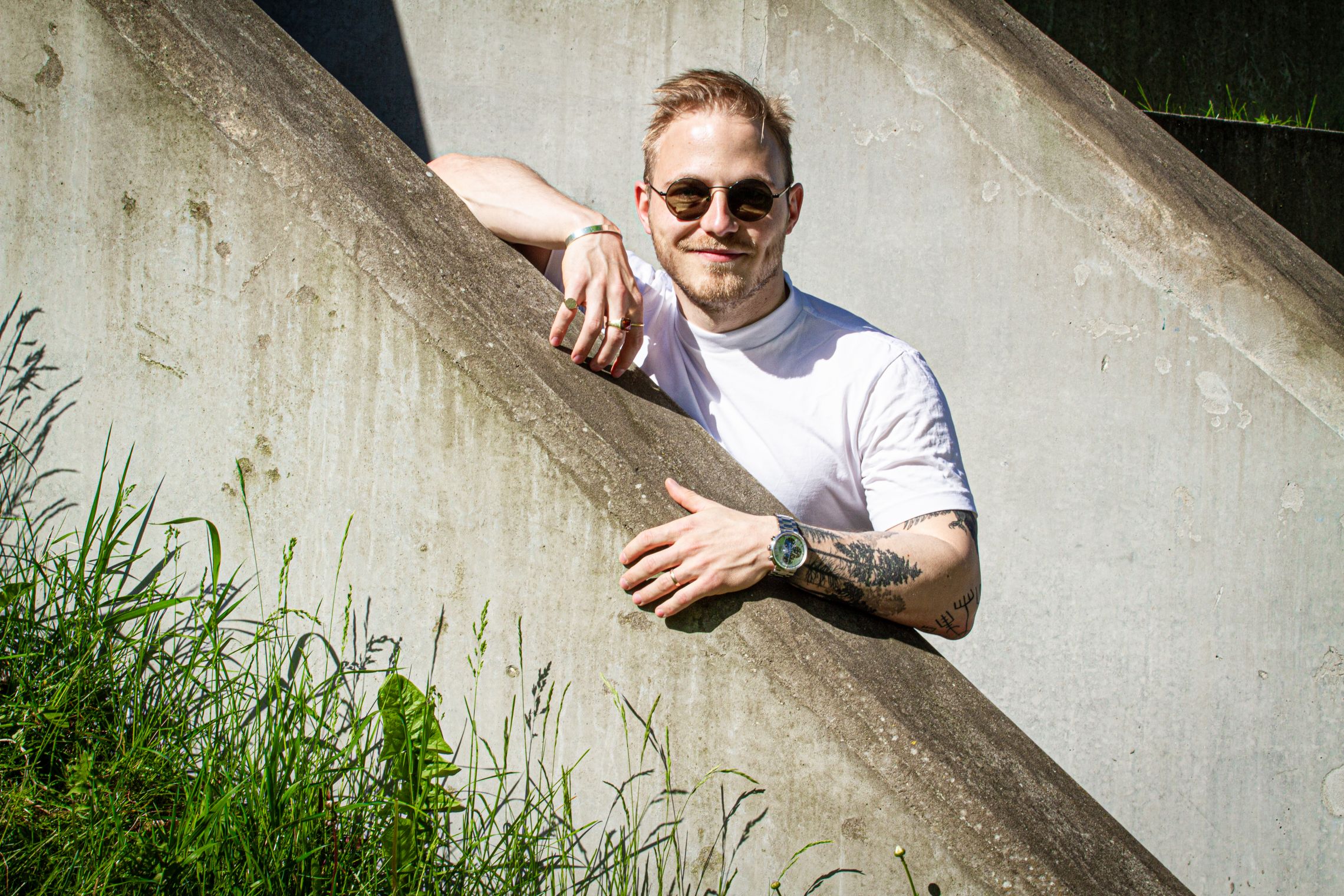 Man standing by a wall