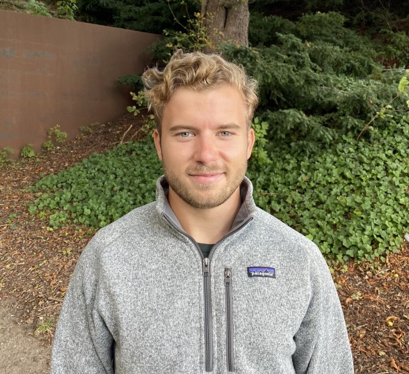 Man in grey sweater