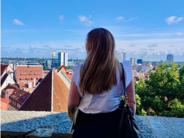 young woman and a view in Tallinn