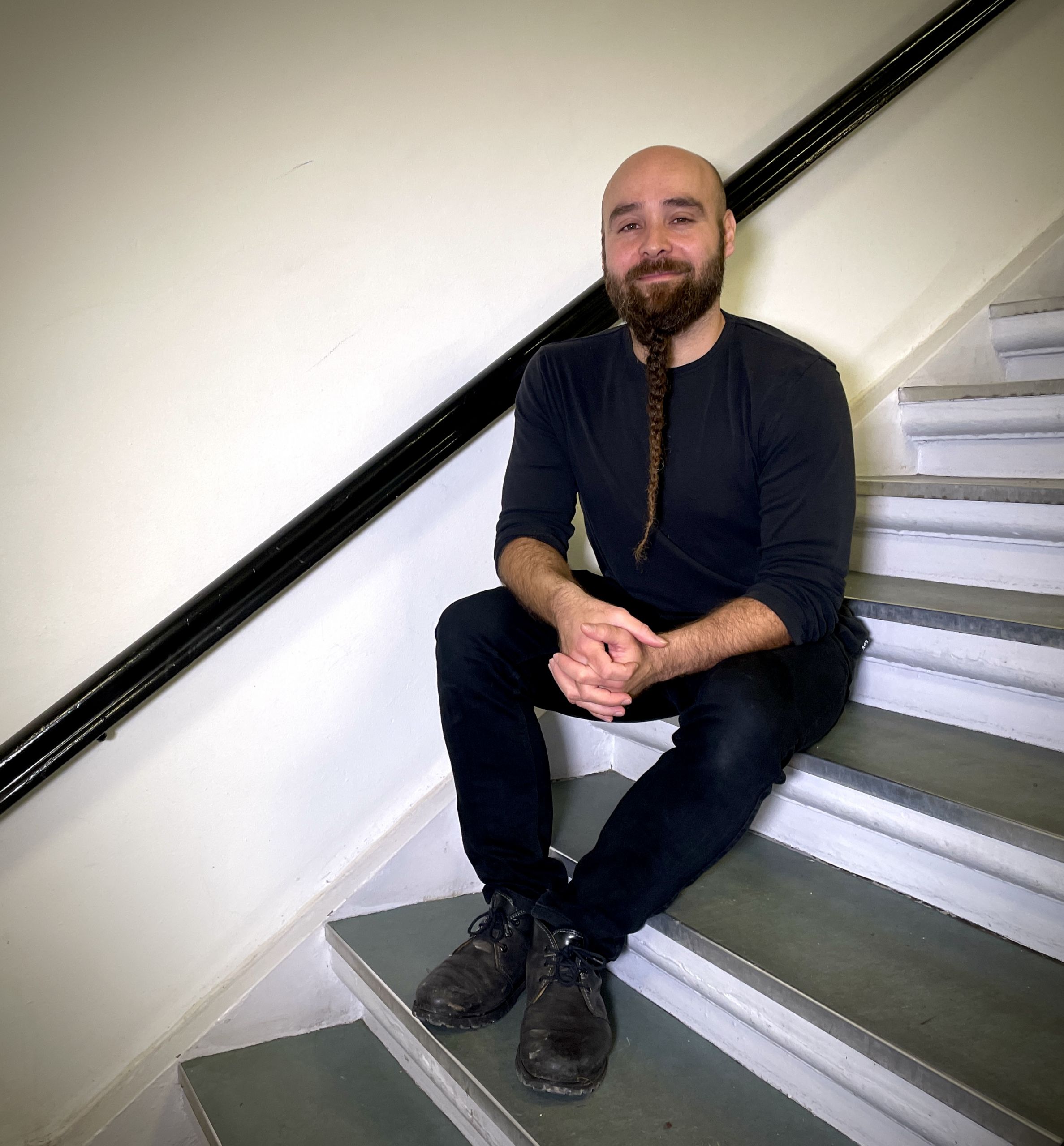 Man sitting on stairs