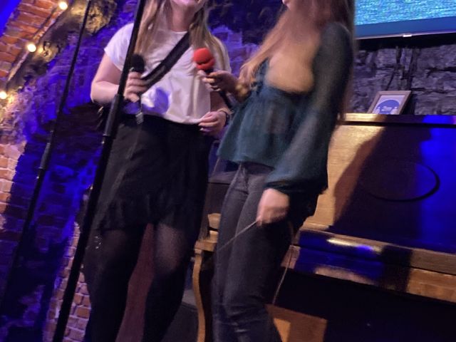 Singing karaoke in Riga, Latvia.