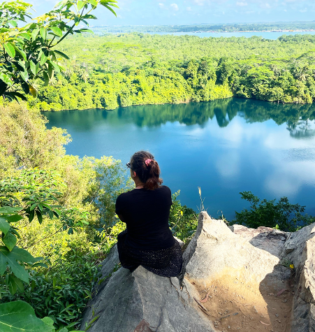 woman staring at a beautiful scenary