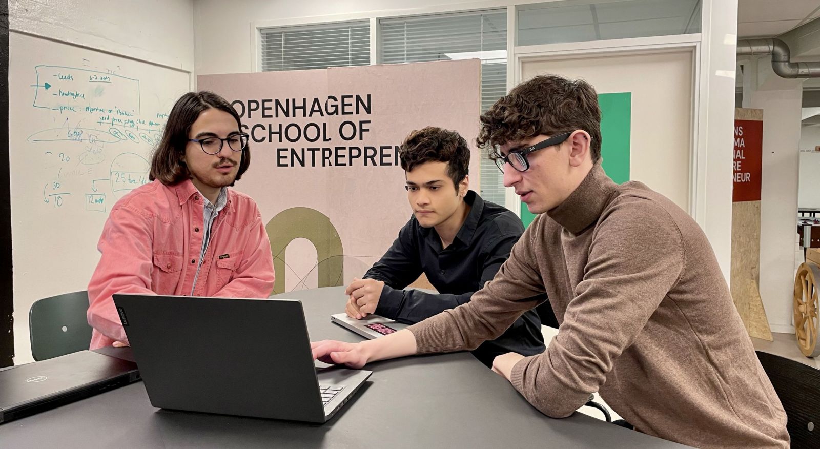 Three male entrepreneurs working